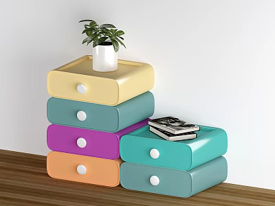 Multicolored Stackable Storage Drawers with Small Plant on Top and Books Beside 3d model