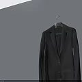 Dark Brown Suit Hanging On Hanger Against White Wall With Gray Floor Reflection