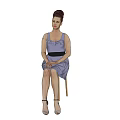 Woman Sitting On A Chair In Blue Dress With Black Belt And High Heels