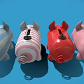 Cute Pig Shaped Toys In Various Colors And Patterns On Blue Background
