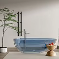 Transparent Blue Bathtub with Greenery Wooden Stool Strawberries Decorative Lamp on Light-Colored Wall Wooden Floor