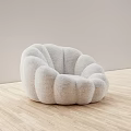 Light Gray Lazy Sofa Featuring Petal Shaped Design And Plush Material On Wooden Floor