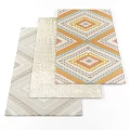 Square Rugs With Geometric Patterns In Neutral Tones And Orange Accents For Home Decor
