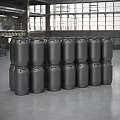 Industrial Equipment Metal Drums Stacked In Large Factory Warehouse Interior