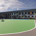Outdoor Basketball Court With Blue Surface Green Area And Kids Playing Near Yellow Buildings