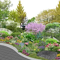 Colorful Flowers And Green Plants In Garden With White Picket Fence And Trees
