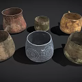 Handcrafted Clay Vessels with Textured Surfaces and Decorative Patterns for Daily Use