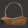 Light Brown Woven Pet Basket With Curved Handle On Dark Background