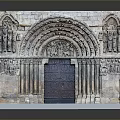 Arched Stone Door With Elaborate Carvings Decorative Columns And Intricate Architectural Details