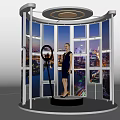 Commercial Display Equipment with Circular Platform Curved Screens Top Lighting and City Night View Background