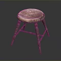 Vintage Wooden Stool With Worn Round Seat And Four Rustic Legs Design
