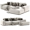 Cozy Sectional Sofa With Plush Pillows Striped Blankets And Neutral Fabric Upholstery