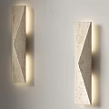 Symmetric Geometric Textured Wall Lamps With Soft Side Lighting Illuminating Wall