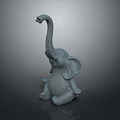 Sitting Elephant Sculpture With Raised Trunk In Simple Style Displayed On Dark Background