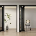 Modern Black Frame Folding Doors Open In Bright Indoor Space With Potted Plant