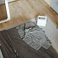 Modern Bedroom Interior With Bed Gray Blanket Round Green Decorative Painting And Wooden Floor