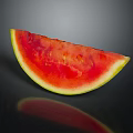 Fresh Watermelon Slice with Red Flesh and Green Rind on Black Background