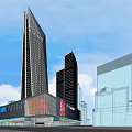 Modern Commercial Complex With Glass Facade And Large Digital Billboard Near High Rises