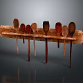 Wooden Kitchen Utensil Set With Various Spoons Hanging On Wooden Board