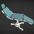 Adjustable Medical Examination Table With Green Padded Surface And Metal Support Frame