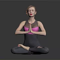 Woman in Lotus Yoga Pose With Hands Namaste Wearing Black Pink Activewear on Gray Background