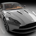 Aston Martin Silver Sports Car Featuring Sleek Body Design Black Alloy Wheels Brown Leather Interior