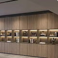 Modern Wooden Bookcase With Open Shelves Displaying Books Decorative Items And Photo Frames