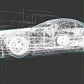 Gray Two Door Sports Car With Wide Body And Large Alloy Wheels