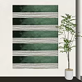 Green Striped Wall Art With White Lines Beside Potted Green Plant