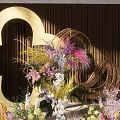 Elegant Floral Installation With Gold Cloud Shaped Decor And Colorful Flowers On Wooden Backdrop