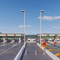 Roadway Toll Facilities With Multiple Toll Booths Electronic Displays And Orange Barriers