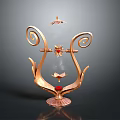 Golden Decorative Ornament With Spiral Design Glass Cover Red Gem And Butterfly Elements