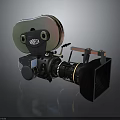Vintage Electronic Movie Camera With Film Reels Lens And Viewfinder Hood