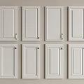White Cabinet Doors Featuring Various Designs And Different Hardware Details Arranged In Rows