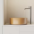 Modern Golden Washbasin with Black Faucet and Flowing Water on White Countertop