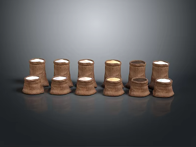 Decorative Brown Candles In Various Sizes Arranged For Home Decoration 3d model