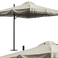 Beige Outdoor Canopy With Black Pole And Tassel Edge Shade Design
