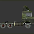 Green Heavy Duty Truck With Cab Over Design And Multiple Wheels