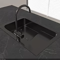 Matte Black Kitchen Sink With Faucet On Black Marble Countertop In Modern Kitchen