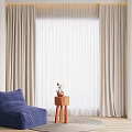 Blue Bean Bag Chair in Living Room with Side Table Decorative Items and Curtains