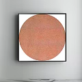 Vibrant Circular Orange Artwork With Black Framed White Background On Gray Wall 3d model