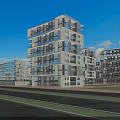 Modern White Multi Storey Residential Building With Large Windows And Balconies Under Blue Sky