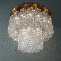 Modern Transparent Glass Chandelier With Layered Design And Golden Circular Base