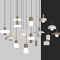 Modern Pendant Lights With Various Designs Metallic Frames And Warm Lighting In Indoor Space
