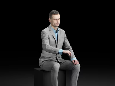 Man in Gray Suit and Blue Shirt Sitting on Black Cube Against Black Background 3d model