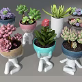 Colorful Succulent Plants in Unique Human Shaped Planters with Pastel Hues