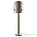 Elegant Modern Floor Lamp With Cylindrical Metal Shade And Warm Ambient Lighting Design