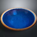 Artistic Hand Carved Ceramic Bowl With Blue Interior And Brown Rim