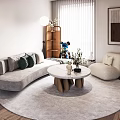 Curved Light Gray Sofa with Cushions and Round Marble Coffee Table in Bright Living Room