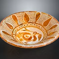 Intricately Carved Orange And White Bowl With Bird Motif Geometric Leaf Patterns
